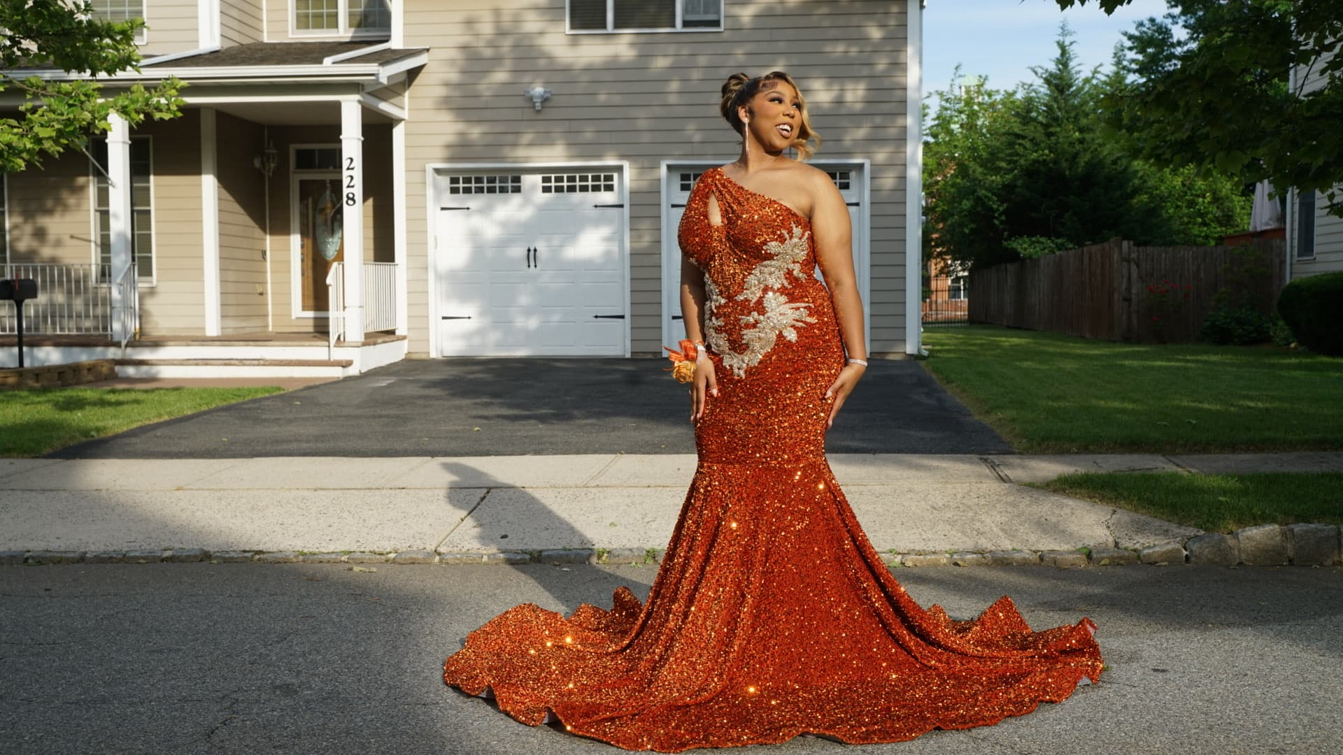 Mikayla Ware in her orange formal gown